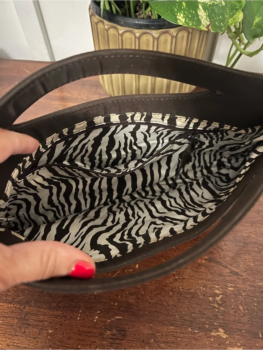 Vera Bradley Black Quilted Brown zebra lining inside Clutch